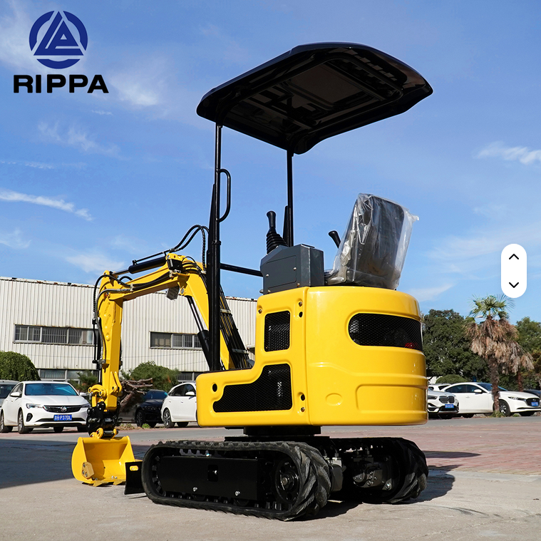 Yellow Rippa R319 mini excavator with swing boom and hydraulic thumb on black rubber tracks.