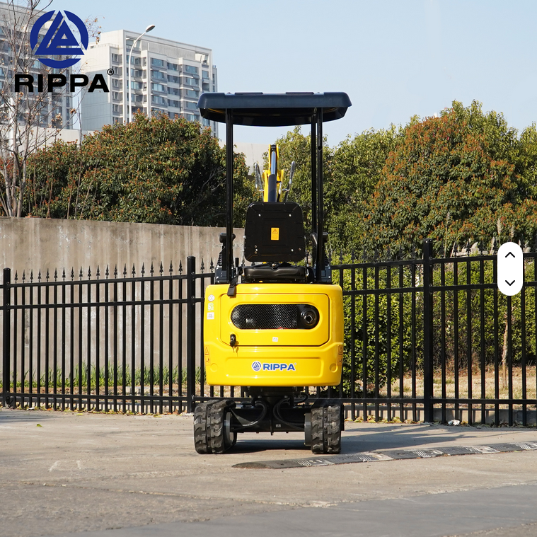 Compact yellow Rippa R319 1 ton mini excavator with black canopy and rear view of tracks.