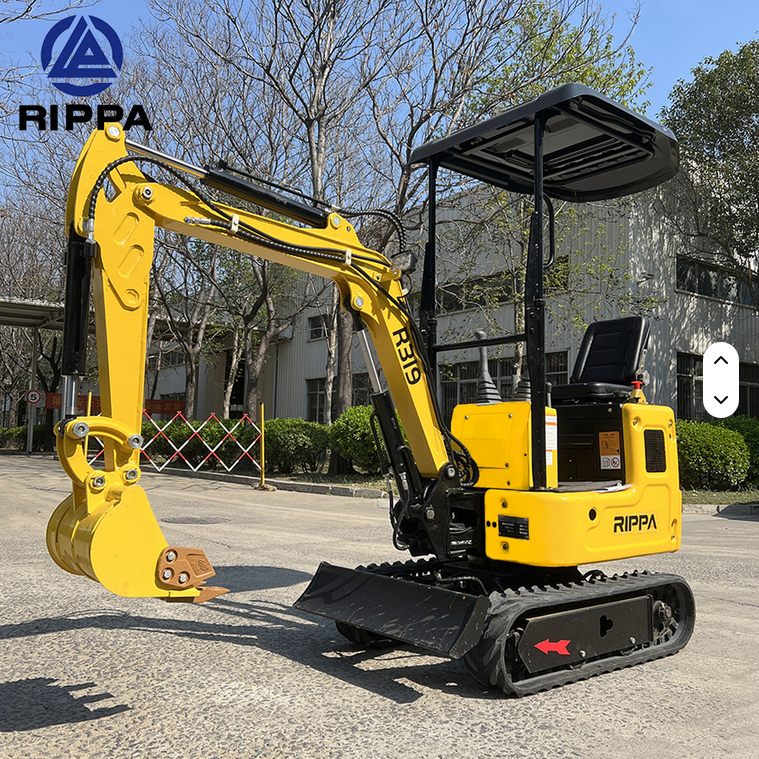 Yellow Rippa R319 mini excavator with black tracks, swing boom, and open operator canopy outdoors.