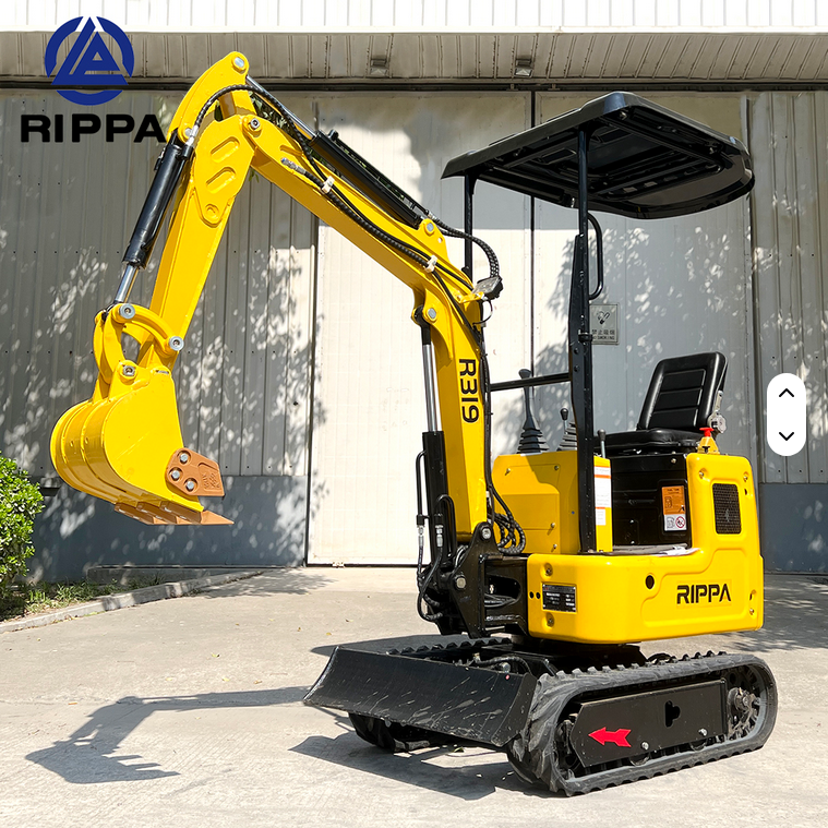 Compact yellow Rippa R319 mini excavator with swing boom, hydraulic thumb, and rubber tracks.