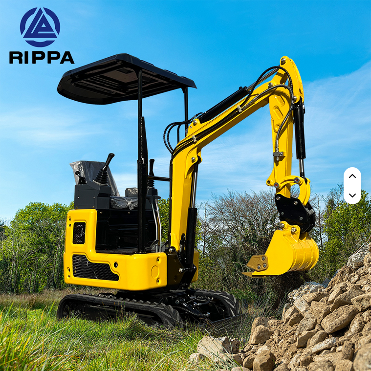 Yellow Rippa R319 1 Ton mini excavator with swing boom, hydraulic thumb, and canopy roof on grass.