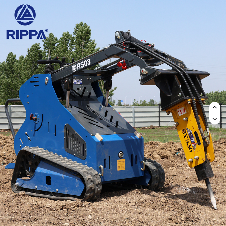 Blue Rippa RS03 skid steer with hydraulic breaker attachment on dirt terrain.